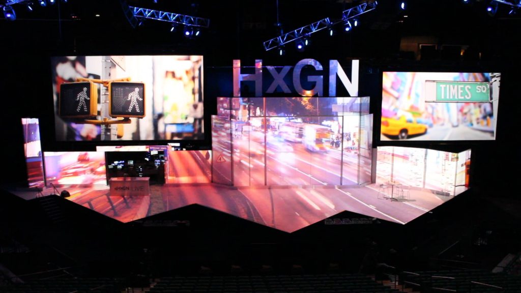 Image showing the projection mapping used at Hexagon's HxGN LIVE! event to transform the entire stage into a single large screen.